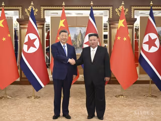 ရှီကျင့်ဖိန်နှင့် ကင်ဂျုံအန်း တွေ့ဆုံဆွေးနွေး