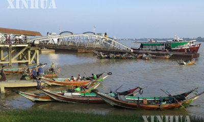 ရန်ကုန်မြစ် အတွင်း သွားလာနေသည့် စက်တပ် သမ္ဗာန်လှေများနှင့် သင်္ဘောများအား တွေ့ရစဉ် (ဆင်ဟွာ)
