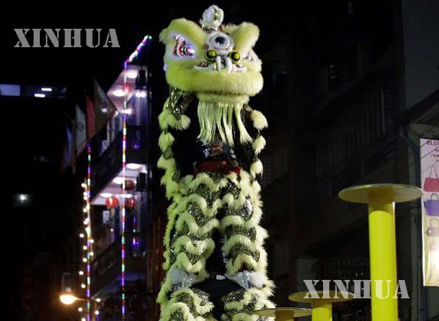 ရန်ကုန်မြို့လယ်တွင် ကျင်းပသော ခြင်္သေ့ အက အလှ စွမ်းရည်ပြိုင်ပွဲ တစ်ခု အားတွေ့ရစဉ် (ဆင်ဟွာ)