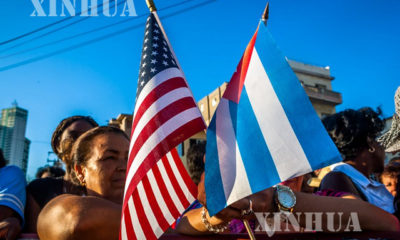 အမေရိကန် အလံ နှင့် ကျူးဘား အလံအား တွေ့ရစဉ် (ဆင်ဟွာ)