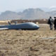 အာဖဂန်နစ္စတန် တောင်ပိုင်းတွင် ပျက်ကျခဲ့သည့် အမေရိကန် မောင်းသူမဲ့လေယာဉ်အား တွေ့ရစဉ် (ဓာတ်ပုံ-အင်တာနက်)