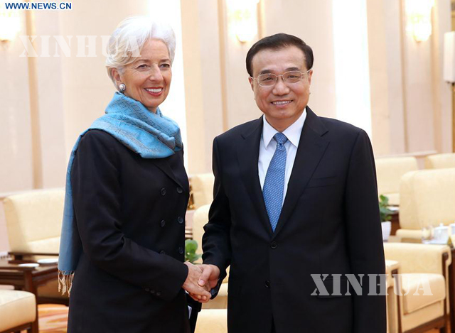 တရုတ်နိုင်ငံ ဝန်ကြီးချုပ် လီခဲ့ချန် က China Development Forum သို့တက်ရောက်လာသော IMF အကြီးအကဲ Christine Lagarde အား ပေကျင်းမြို့တွင် လက်ခံတွေ့ဆုံစဉ် (ဆင်ဟွာ )