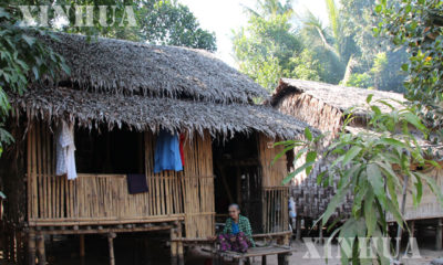 လျှပ်စစ်ဓာတ်အားမရရှိသေးသော ကျေးလက်နေအိမ်များကို တွေ့ရစဉ် (ဆင်ဟွာ)