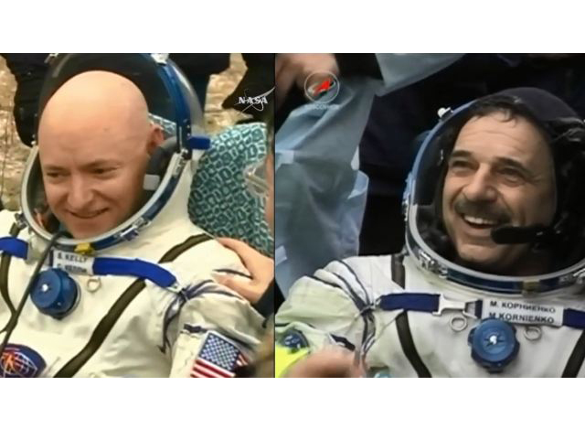 ရုရှားအာကာသ ယာဉ်မှူး မီခေး ကော်နီအန်ကို နှင့် အမေရိကန် အာကာသ ယာဉ်မှူး စကော့ကယ်လီ တို့အား တွေ့ရစဉ် (ဓာှတ်ပုံ - NASA)