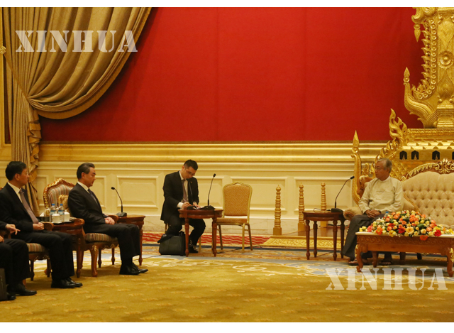 နိုင်ငံတော်သမ္မတ ဦးထင်ကျော်က တရုတ်နိုင်ငံခြားရေးဝန်ကြီး ဝမ်ရိ အား လက်ခံတွေ့ဆုံစဉ် (ဆင်ဟွာ)