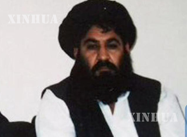 တာလီဘန် ခေါင်းဆောင် မူလာ အက်ခ်တာ မိုဟာမက် မန်ဆာအား တွေ့ရစဉ် (ဆင်ဟွာ)