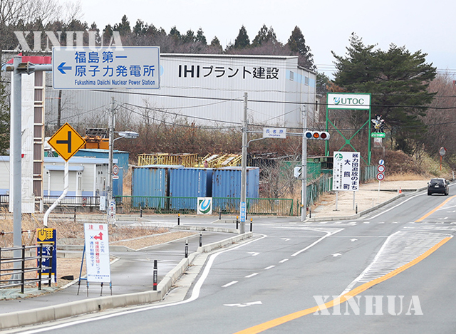 ဖူကူရှီးမား နျူကလီးယား မတော်တဆမှုအတွင်း ဓာတ်ပေါင်းဖို တည်ရှိရာလမ်းအား ပိတ်ထားစဉ် (ဆင်ဟွာ)