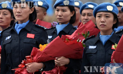 အမျိုးသမီး ငြိမ်းချမ်းရေး တပ်ဖွဲ့ဝင်များအား တွေ့ရစဉ် (ဆင်ဟွာ)