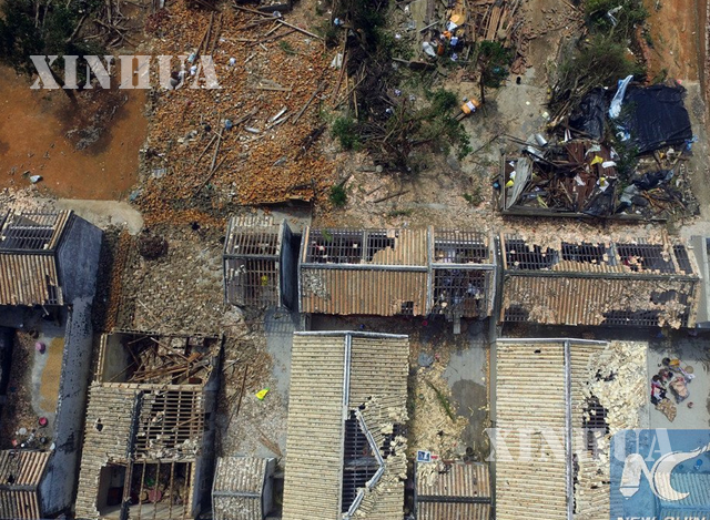 လေဆင်နှာမောင်း တိုက်ခတ်ပြီးနောက် ပျက်စီးမှုများအား တွေ့ရစဉ် (ဆင်ဟွာ)