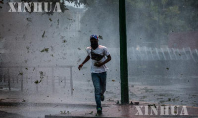 ဗင်နီဇွဲလားတွင် အစားအစာ ပြတ်လပ်မှုကြောင့် အကြမ်းဖက် ဆန္ဒပြမှုများ ဖြစ်ပွားနေစဉ် (ဆင်ဟွာ)
