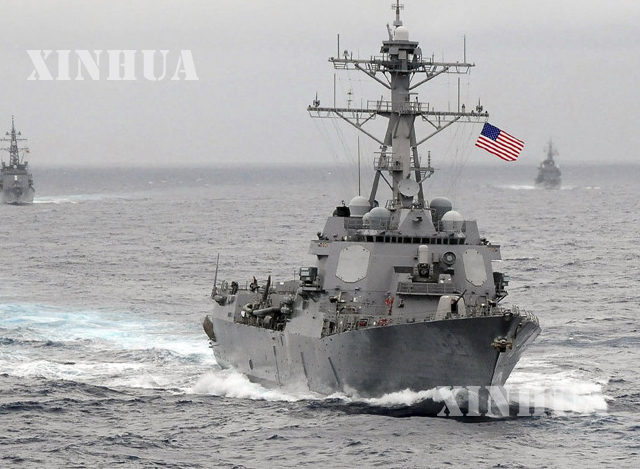 တောင်တရုတ်ပင်လယ်၌ သွားလာနေသော အမေရိကန် စစ်သင်္ဘောများအား တွေ့ရစဉ် (ဆင်ဟွာ)