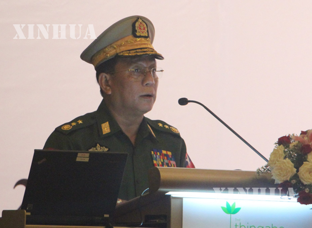 ထိုင်းနိုင်ငံရောက် မြန်မာ ဒုက္ခသည်များ နေရပ် ပြန်လာရေး မဟာဗျူဟာမြောက် လုပ်ငန်း စီမံချက်တစ်ရပ် ရေးဆွဲနိုင်ရေး အလုပ်ရုံ ဆွေးနွေးပွဲတွင် နယ်စပ်ရေးရာ ဝန်ကြီးဌာန ပြည်ထောင်စုဝန်ကြီး ဒုတိယ ဗိုလ်ချုပ်ကြီး ရဲအောင် မိန့်ခွန်းပြောနေစဉ် (ဆင်ဟွာ)