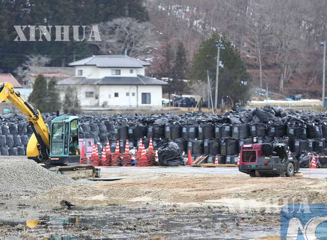 ဖူကူရှီးမား နျူကလီးယား ဓာတ်ရောင်ခြည်သင့် မြေသားများအား ပြန်လည်အသုံးပြုရန် အတွက် ထုတ်ပိုးနေစဉ် (ဆင်ဟွာ)