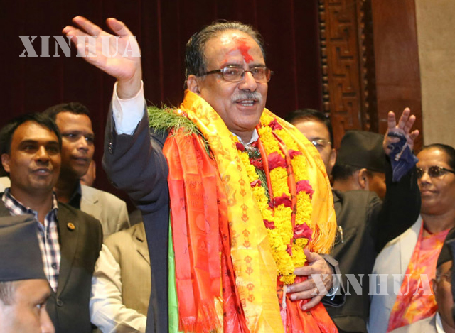 နီပေါ၏ ဝန်ကြီးချုပ်သစ် အဖြစ်ရွေးချယ်တင်မြှောက်ခံရသည့် Pushpa Kamal Dahalအားတွေ့ရစဉ် (ဆင်ဟွာ)