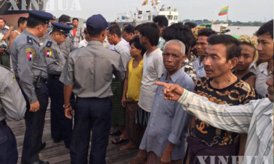 ရန်ကုန် နန်းသီတာ ဆိပ်ကမ်းသို့ပြန်လည် ရောက်ရှိလာသော နစ်မြုပ် စက်လှေများမှ ခရီးသည်များနှင့် တာဝန်ရှိသူများအား တွေ့ရစဉ်(ဆင်ဟွာ)