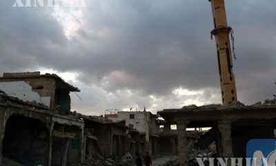 IS တို့သိမ်းပိုက်ထားခဲ့သည့် အလက်ပိုမြို့အား တွေ့ရစဉ် (ဆင်ဟွာ)