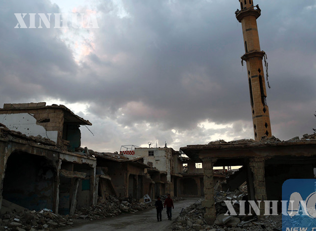 IS တို့သိမ်းပိုက်ထားခဲ့သည့် အလက်ပိုမြို့အား တွေ့ရစဉ် (ဆင်ဟွာ)