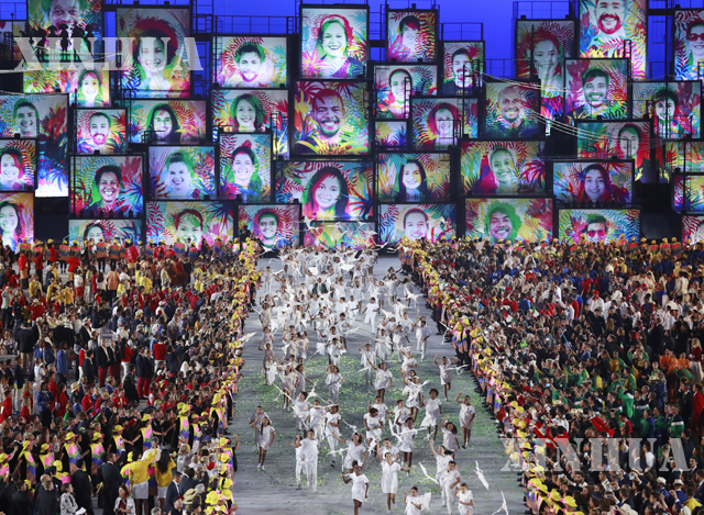 အိုလံပစ် အားကစားပွဲတော် ဖွင့်ပွဲအခမ်းအနားအား တွေ့ရစဉ် (ဆင်ဟွာ)