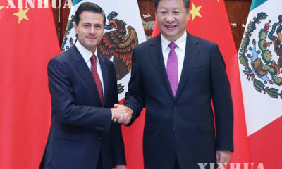 တရုတ်နိုင်ငံံသမ္မတ ရှီကျင့်ဖိန်နှင့် မက္ကဆီကိုနိုင်ငံသမ္မတ အန်းရစ်ပီနာနီအက်တို တို့အား G-20 အစည်းအဝေး၌ တွေ့ရစဉ် (ဆင်ဟွာ)