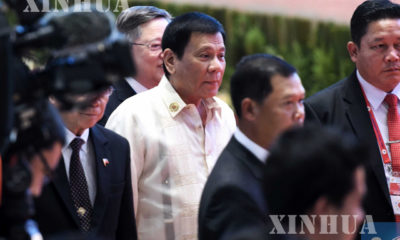 အာဆီယံထိပ်သီးအစည်းအဝေးသို့တက်ရောက်လာသော ဖိလစ်ပိုင်နိုင်ငံ သမ္မတ ဒူတာတေးအားတွေ့ရစဉ် (ဆင်ဟွာ)