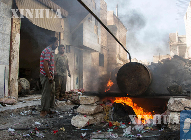 ဆီးရီးယားနိုင်ငံ အလက်ပိုမြို့၌ စက်တင်ဘာလ ၁ဝ ရက်က လေကြောင်းတိုက်ခိုက်မှုအပြီးတွေ့ရစဉ်(ဆင်ဟွာ)