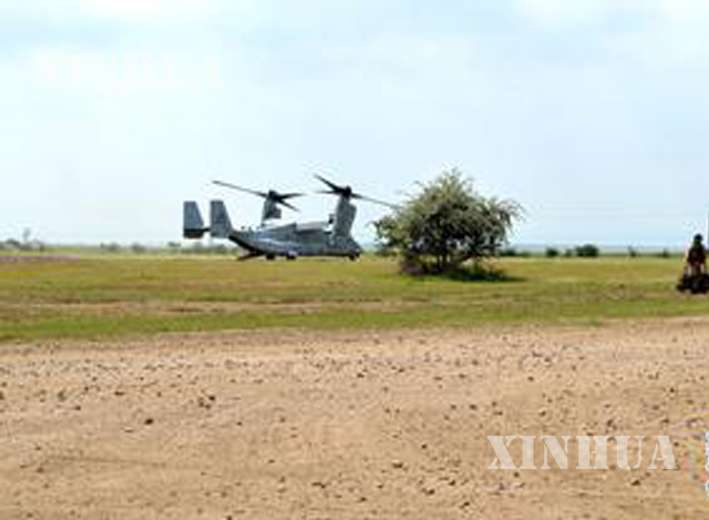 MV-22 ရဟတ္ယာဥ္တစ္စင္း အားျမင္ေတြ႕ရစဥ္(ဆင္ဟြာ)