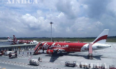 မေလးရွားေလေၾကာင္းလိုင္း AirAsia ပိုင္ေလယာဥ္တစ္စီးအား ေတြ႕ရစဥ္ (ဆင္ဟြာ)