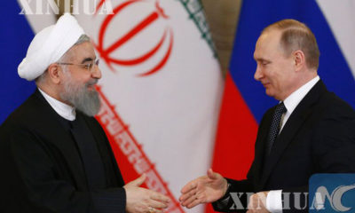 အီရန္ႏိုင္ငံ သမၼတ Hassan Rouhani (ဝဲ) ႏွင့္ ရုရွားႏို္င္ငံ သမၼတ ဗလာဒီမာ ပူတင္ (ယာ) တို႔အား ေတြ႕ရစဥ္ (ဆင္ဟြာ)