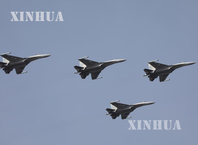 တရုတ္ႏုိင္ငံ၏ Su-35 ဂ်က္တုိက္ေလယာဥ္မ်ား ႏွင့္ J-20 ဂ်က္ေလယာဥ္မ်ား ေတာင္တရုတ္ပင္လယ္၌ ကင္းလွည့္ေနစဥ္(ဆင္ဟြာ)