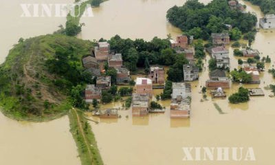 ေရႀကီးေရလွ်ံမႈ ျဖစ္ပြားသည့္ ေနရာ တစ္ခု အား ျမင္ေတြ႕ရစဥ္(ဆင္ဟြာ)