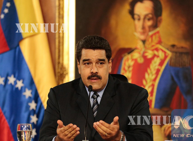 ဗင္နီဇြဲလားႏုိင္ငံသမၼတ Nicolas Maduro အား ေတြ ့ရစဥ္ (ဆင္ဟြာ)
