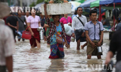 ရန္ကုန္ၿမဳိ ့ဝါးတန္းဆိပ္ကမ္းအနီးတြင္ ၾသဂုတ္လ အတြင္း ထူးကဲဒီေရျမင့္တက္ၿပီး ေရႀကီးေနမႈ အား ေတြ႕ရစဥ္ (ဆင္ဟြာ)