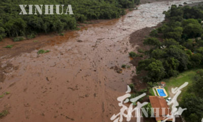 ဘရာဇီးႏုိင္ငံ Minas Gerais ျပည္နယ္တြင္ ျဖစ္ပြားသည့္ ဆည္က်ိဳးမႈအခ်င္းျဖစ္ေနရာ အနီးတ၀ုိက္အားေတြ႔ရစဥ္ (ဆင္ဟြာ)