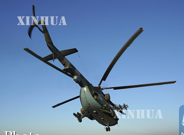 ကာဇက္စတန္ႏုိင္ငံမွ Mi-8 စစ္ဘက္သံုးရဟတ္ယာဥ္တစ္စင္းအားေတြ ့ရစဥ္(ဆင္ဟြာ)