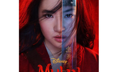 တ႐ုတ္ဘာသာစကားေျပာ “Mulan” ရုပ္ရွင္ဇာတ္ကားပိုစတာအား ေတြ႕ရစဥ္ (ဓာတ္ပံု-အင္တာနက္)