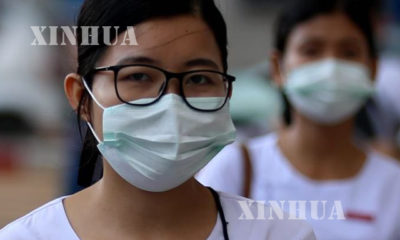 H1N1 ပိုးကူးစက္မႈမရွိရန္ maskတပ္ဆင္သံုးစြဲသူအားေတြ႔ရစဥ္ (ဓာတ္ပံု- ဆင္ဟြာ)
