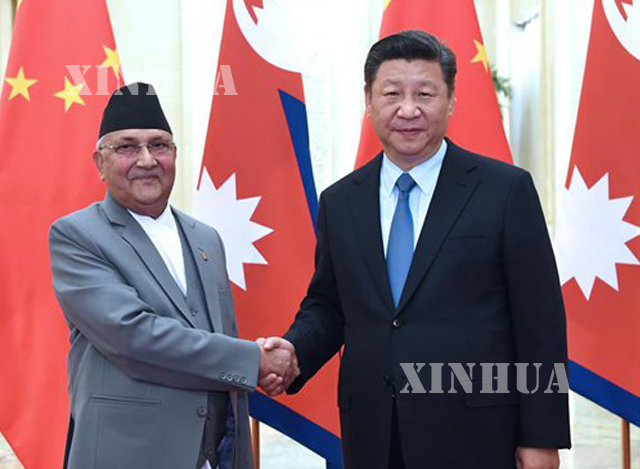 တရုတ်နိုင်ငံ သမ္မတ ရှီကျင့်ဖိန် (ယာ) နှင့် နီပေါနိုင်ငံ ဝန်ကြီးချုပ် ကေပီ ရှာမာအိုလီ (KP Sharma Oli) တို့အား တွေ့ရစဉ် (ဆင်ဟွာ)