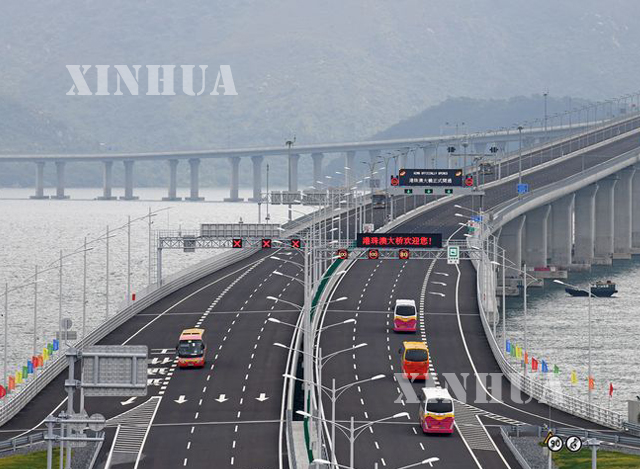 ဟောင်ကောင်-ကျူးဟိုင်-မကာအို တံတားအားတွေ့ရစဉ် (ဆင်ဟွာ)