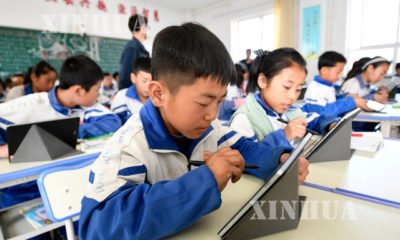 တရုတ်နိုင်ငံရှိ ကလေးငယ်တစ်ချို့ပညာသင်ကြားနေစဉ်