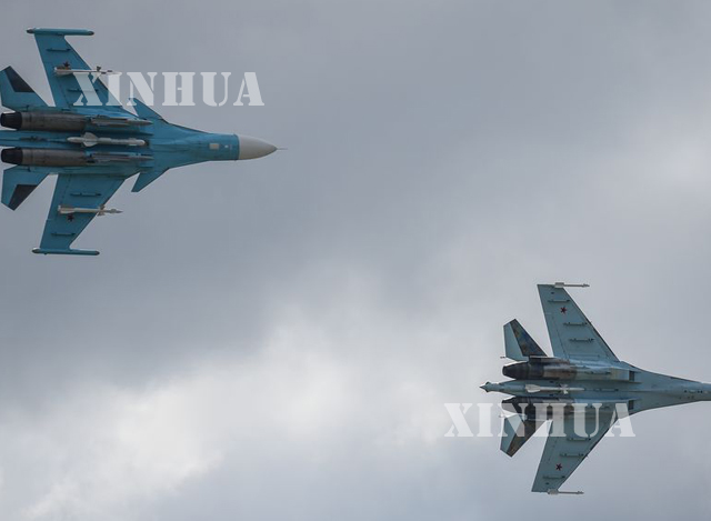 ရုရှားနိုင်ငံထုတ် Su-34 (ဝဲ) နှင့် Su-35 (ယာ) ဂျက်တိုက်လေယာဉ်များ ပျံသန်းလေ့ကျင့်စဉ်(ဆင်ဟွာ)