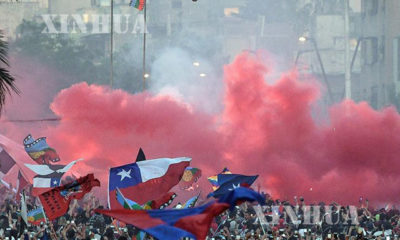 ချီလီနိုင်ငံ ဆန်တီရာဂိုမြို့တွင် ဆန္ဒပြမှု၌ ပါဝင်သူများအားတွေ့ရစဉ် (ဆင်ဟွာ)