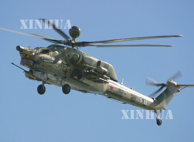 Mi-28 တိုက်ခိုက်ရေးရဟတ်ယာဉ်တစ်စင်းအား တွေ့ရစဉ် (ဆင်ဟွာ)