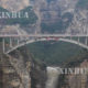 စီချွမ်၊ ယူနန်နှင့် ကွေ့ကျိုး ပြည်နယ်သုံးခုကို ချိတ်ဆက်ထားသည့် ကျိမင်တံတားအား တွေ့ရစဉ် (ဆင်ဟွာ)