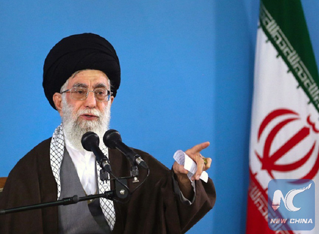 အီရန်နိုင်ငံ ထိပ်တန်းခေါင်းဆောင် အယာတိုလာ အလီ ခါမေနီအား တွေ့ရစဉ် (ဆင်ဟွာ)
