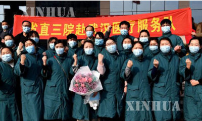 ဟူပေပြည်နယ်သို့ သွားရောက်ကူညီသည့် ဆေးကုသရေးအဖွဲ့ဝင်များအား တွေ့ရစဉ်(ဆင်ဟွာ)