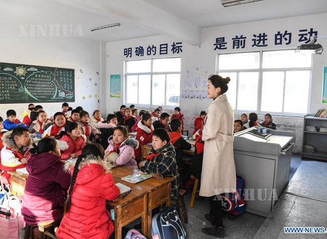 တရုတ်နိုင်ငံ ကျန်းဆူးပြည်နယ်ရှိ မူလတန်းကျောင်းတွင် စာသင်ကြားနေသူများအား ၂၀၁၉ ခုနှစ် မတ်လ ၂၅ ရက်က တွေ့ရစဉ် (ဆင်ဟွာ)