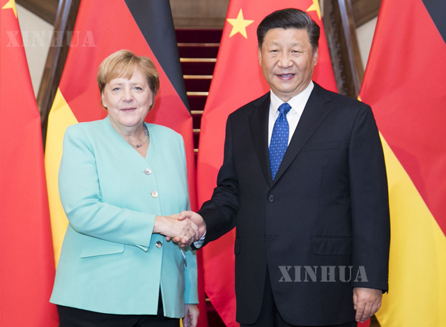တရုတ်နိုင်ငံ သမ္မတ ရှီကျင့်ဖိန်နှင့် ဂျာမနီနိုင်ငံ ဝန်ကြီးချုပ် အိန်ဂျလာ မာကဲလ်အား တွေ့ရစဉ် (ဆင်ဟွာ)