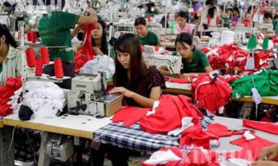 ရန်ကုန်မြို့တွင်းရှိ အထည်ချုပ်စက်ရုံ၌ လုပ်သားများအလုပ်လုပ်ကိုင်နေမှုအားတွေ့ရစဉ်(ဆင်ဟွာ)