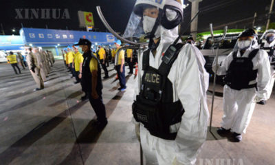 ဘန်ကောက်မြို့၌ တာဝန်ထမ်းဆောင်နေကြသော ရဲတပ်ဖွဲ့ဝင်များအား တွေ့ရစဉ်(ဆင်ဟွာ)