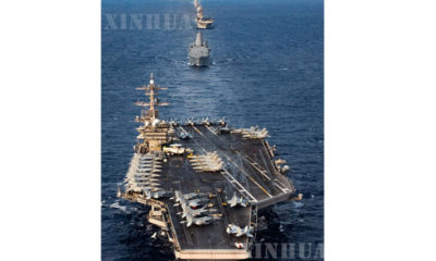ကိုရိုနာဗိုင်းရပ်စ်ကူးစက်ခံရသည့် အမေရိကန် USS သီအိုဒိုရုဒ်စဗဲ့ လေယာဉ်တင်သင်္ဘောအားတွေ့ရစဉ်(ဆင်ဟွာ)